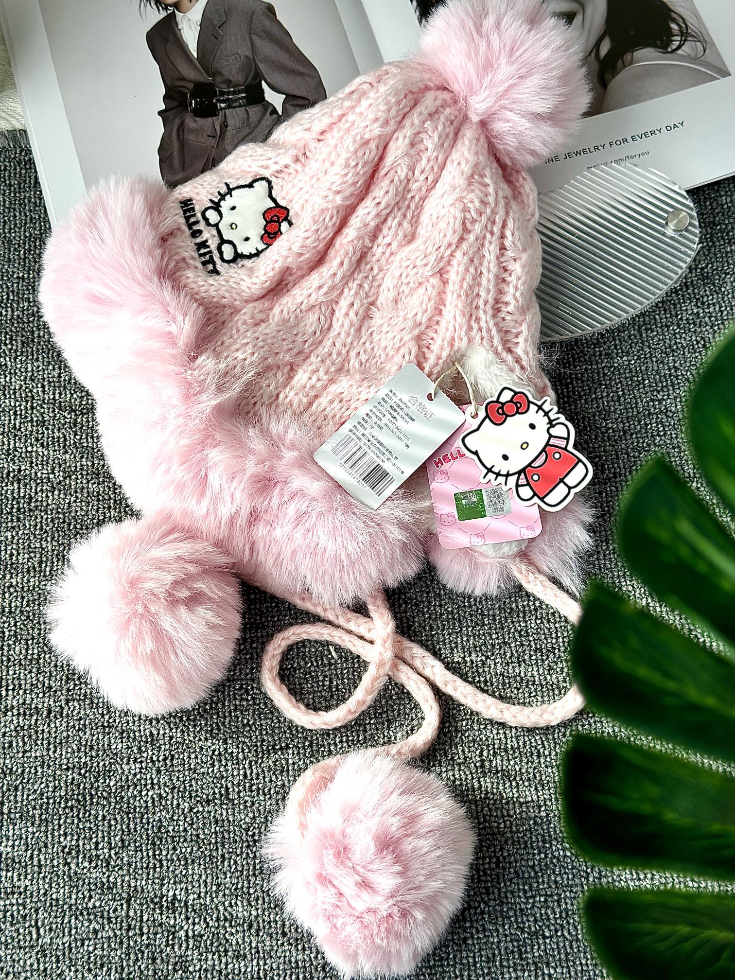 Hello Kitty Pink Pom-Pom Knit Beanie. Crafted from a soft, plush-texture - Comprehensive 9