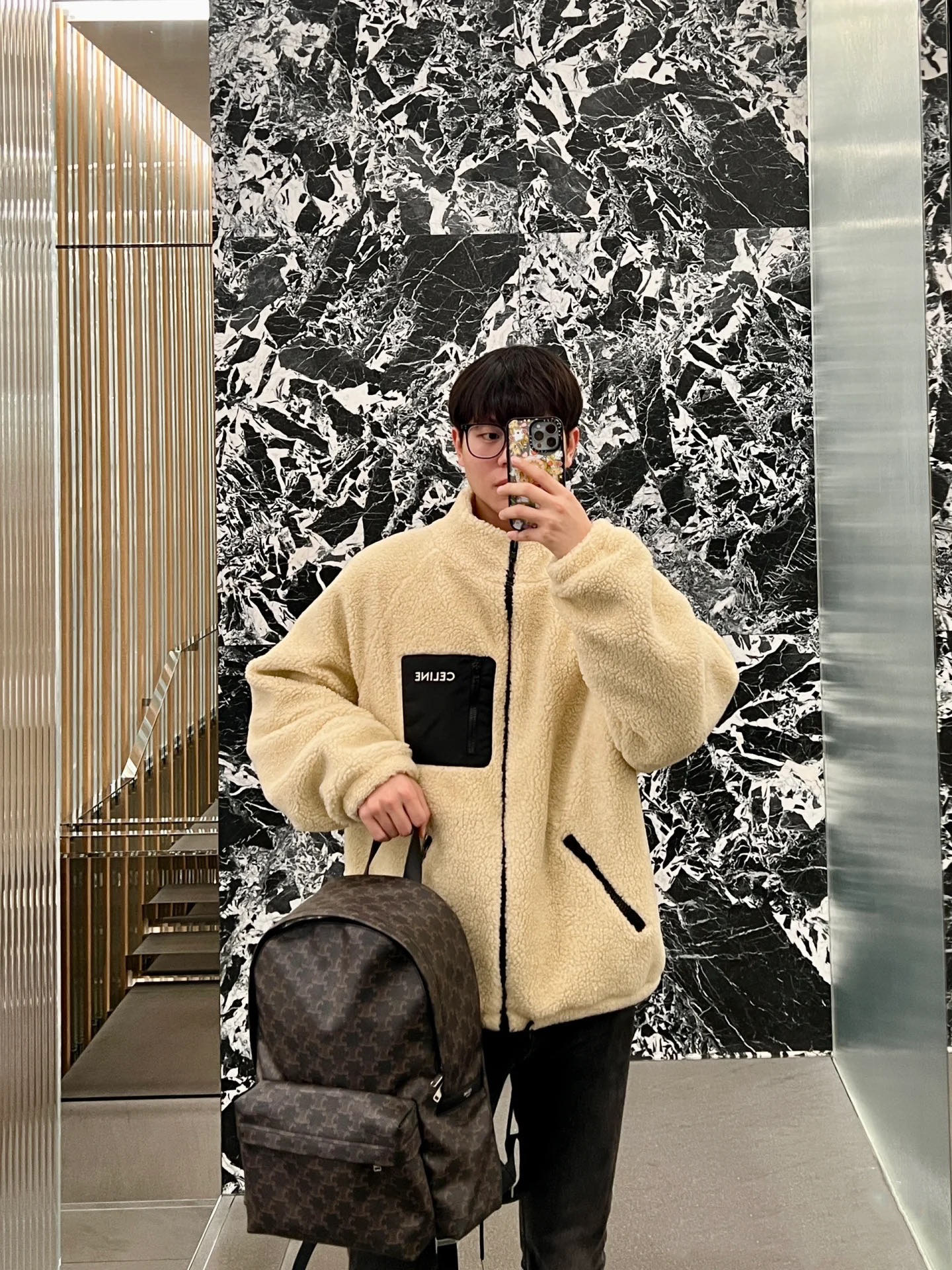 Celine The main compartment can easily accommodate a 15-inch laptop or short-distance travel items. It is equipped with a front zipper pocket to