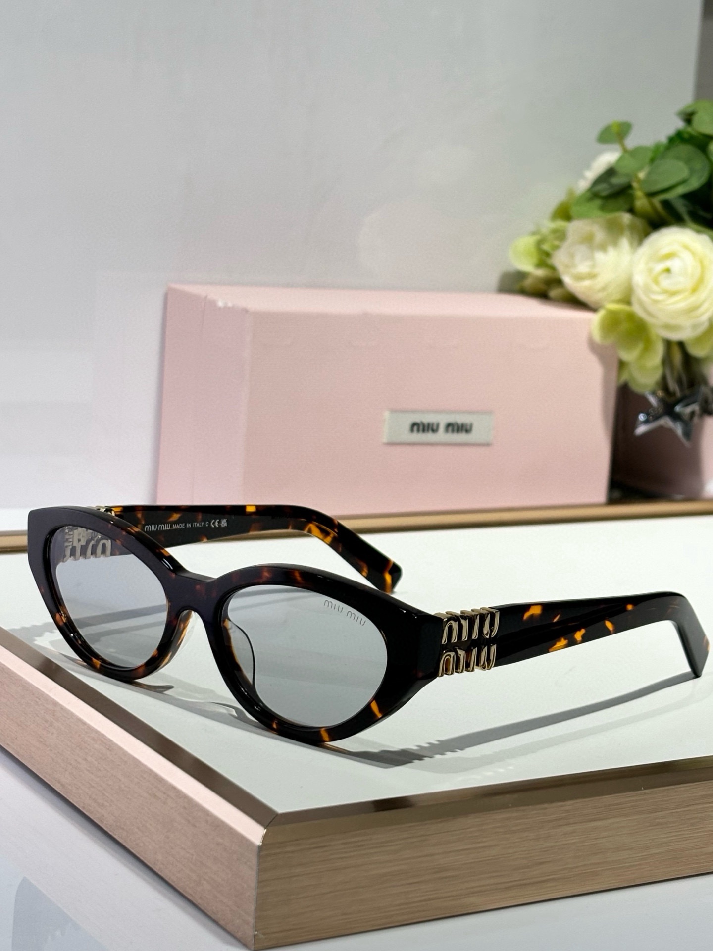  MIUMIU
ModMUA04S
SIZE55-18-140

