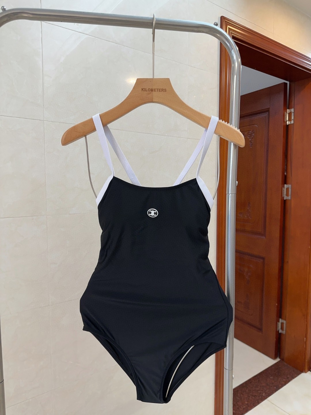 Stylish Céline Bathing Suit for Beach Photography: Fashionable and Beautiful Design.