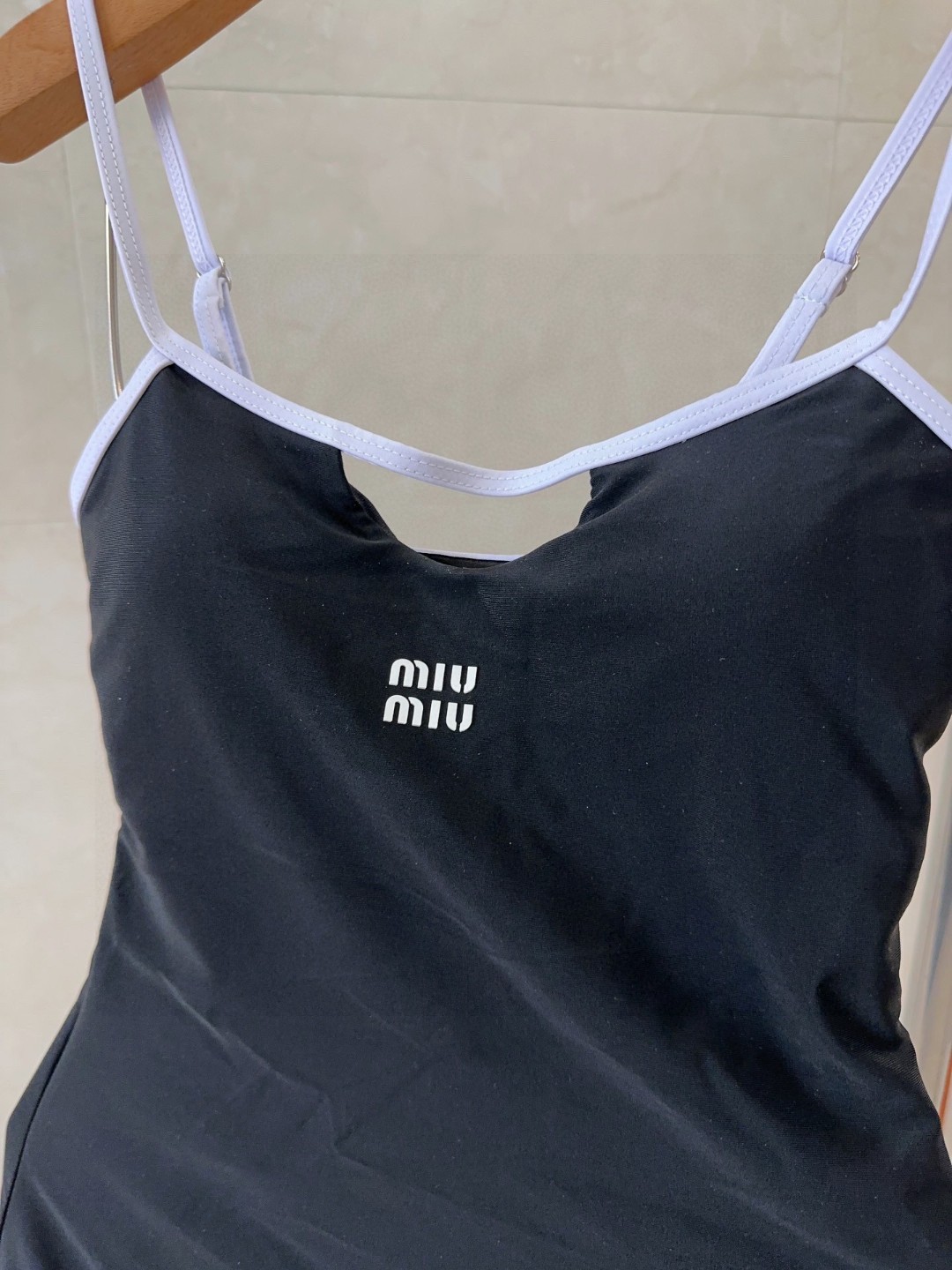 '
miumiu泳衣，时尚潮人必备！实物超级好看！海边度假拍照超级好！SML