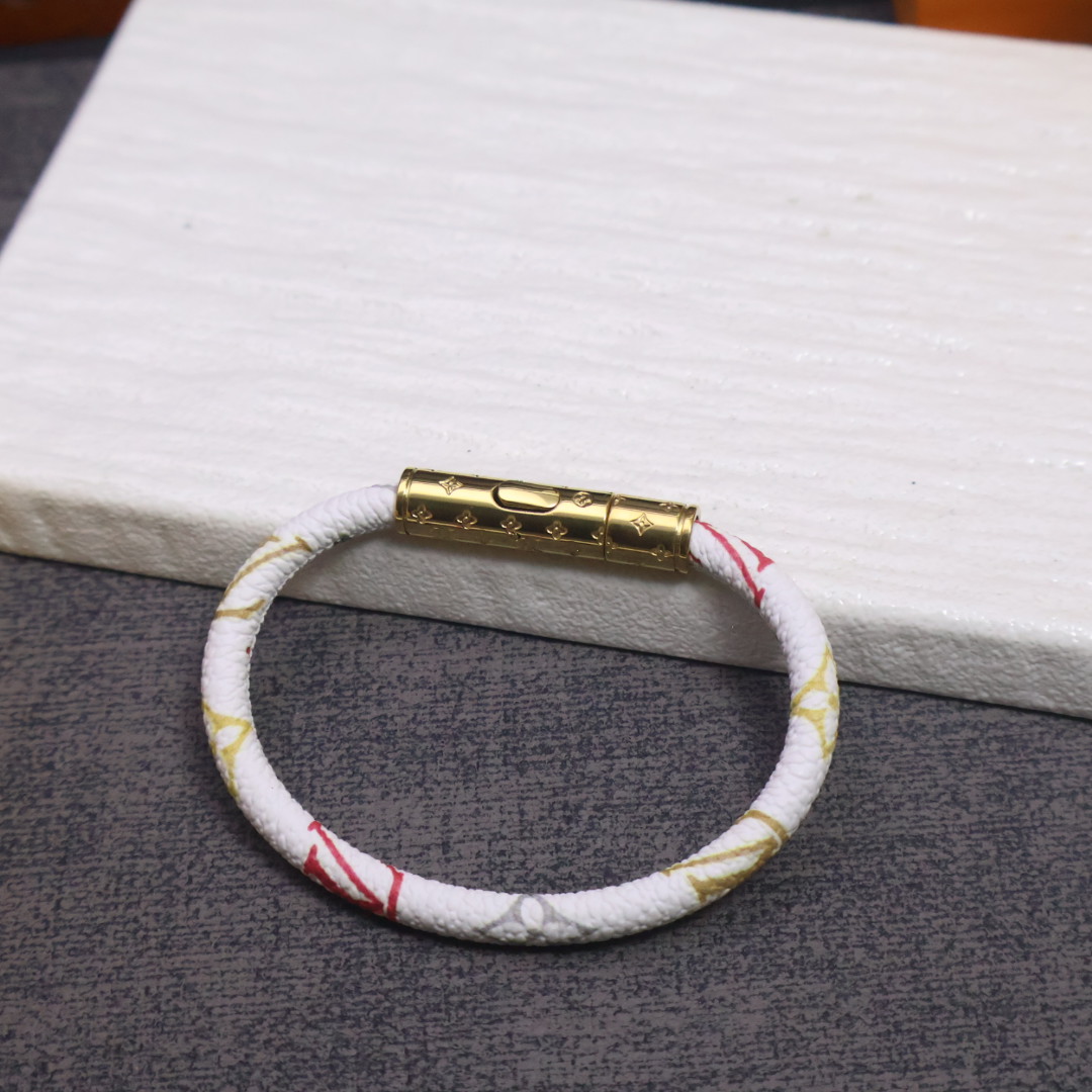 Monochain Reverso 手镯经典 Monogram EcliPse 帆布拼合丝滑小牛皮内衬，