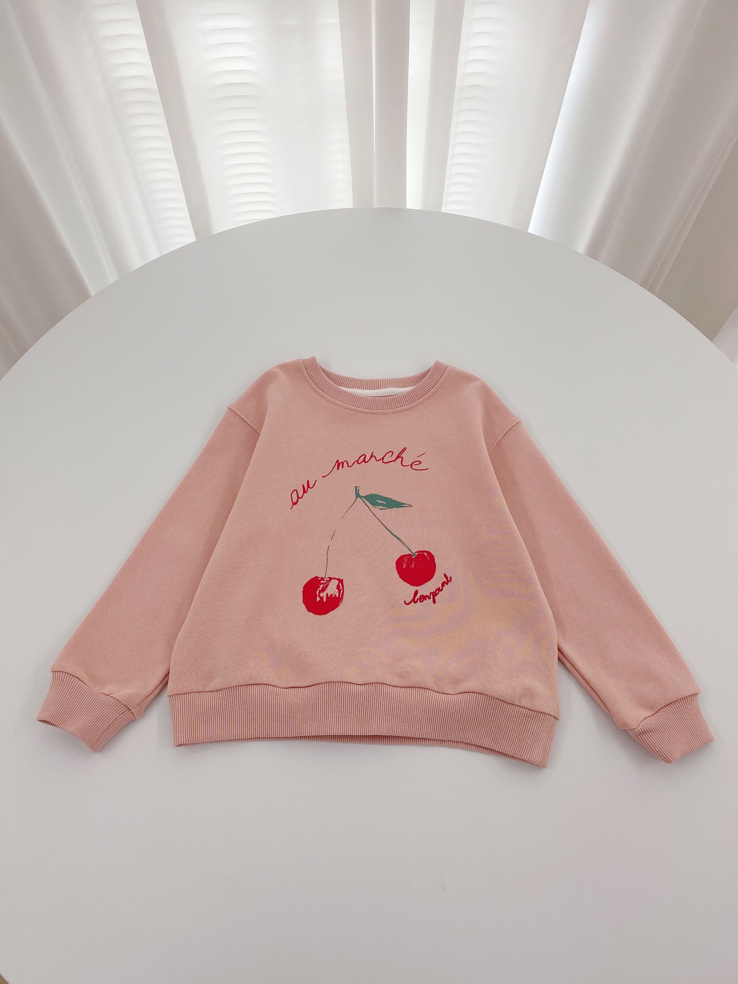 Sweet and Romantic Pink Autumn Baby Closet with Classic Circle Design.