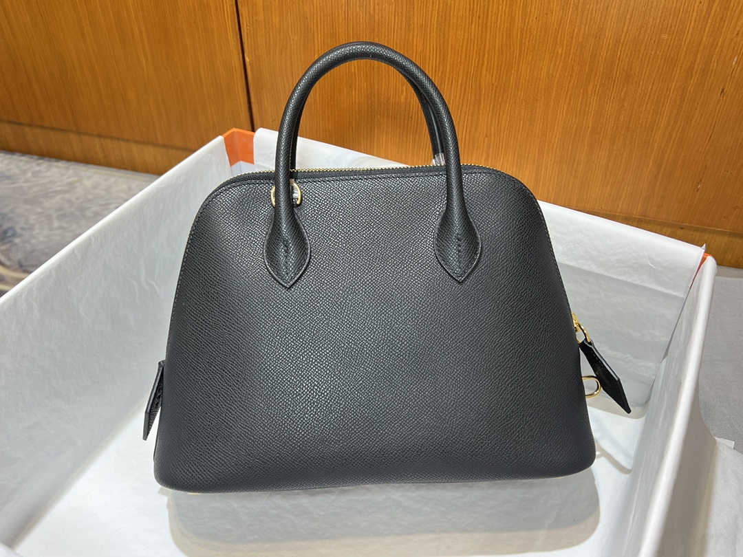 Bolide25 bolso de bolos en piel Epsom, negro, cierre dorado, minimalista y discreto, tamaño dorado de 25cm, fácil de ll…
