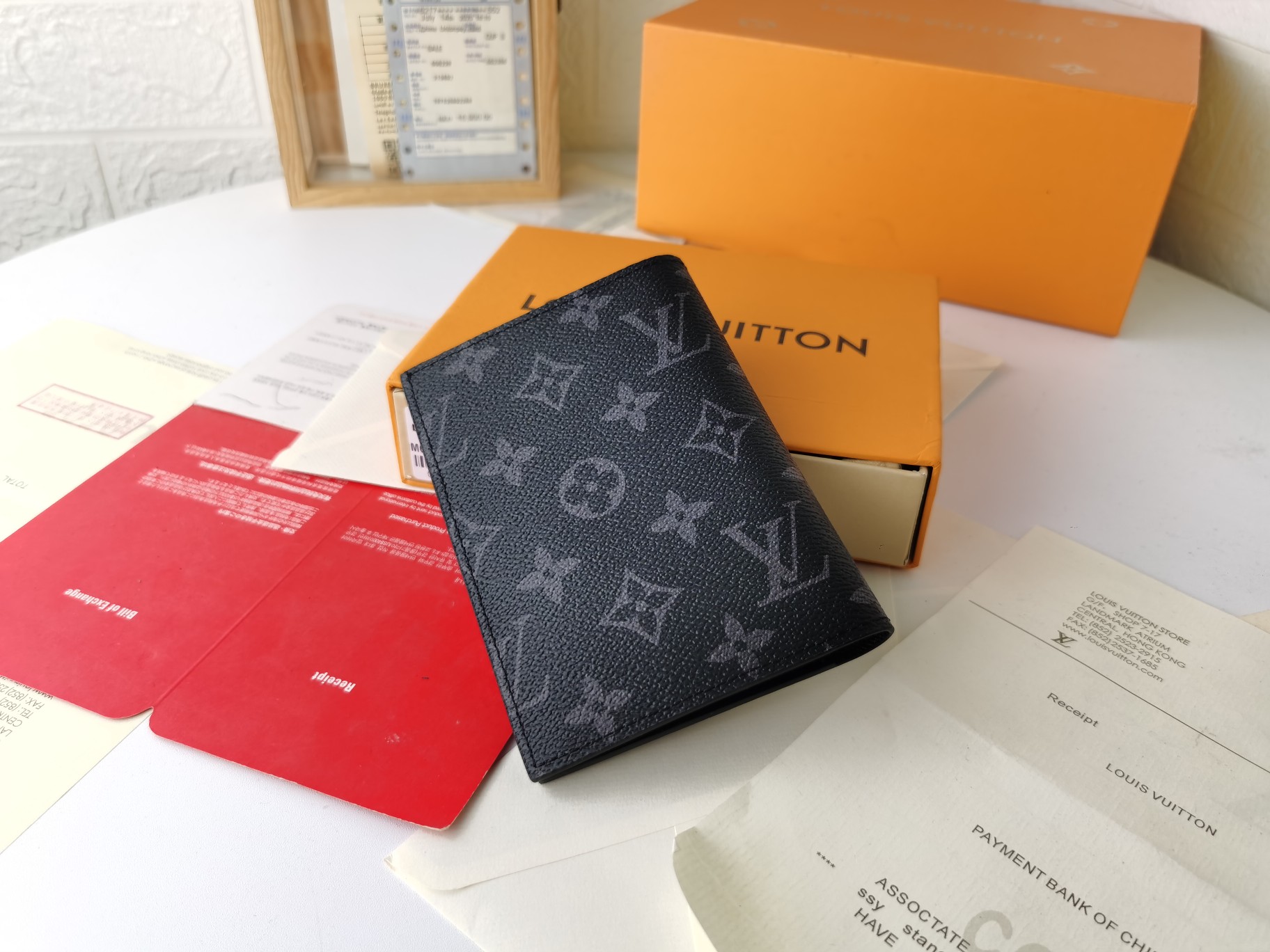 M64502パスポートケース - 粒纹小牛皮内衬の高級感溢れる旅行アクセサリー