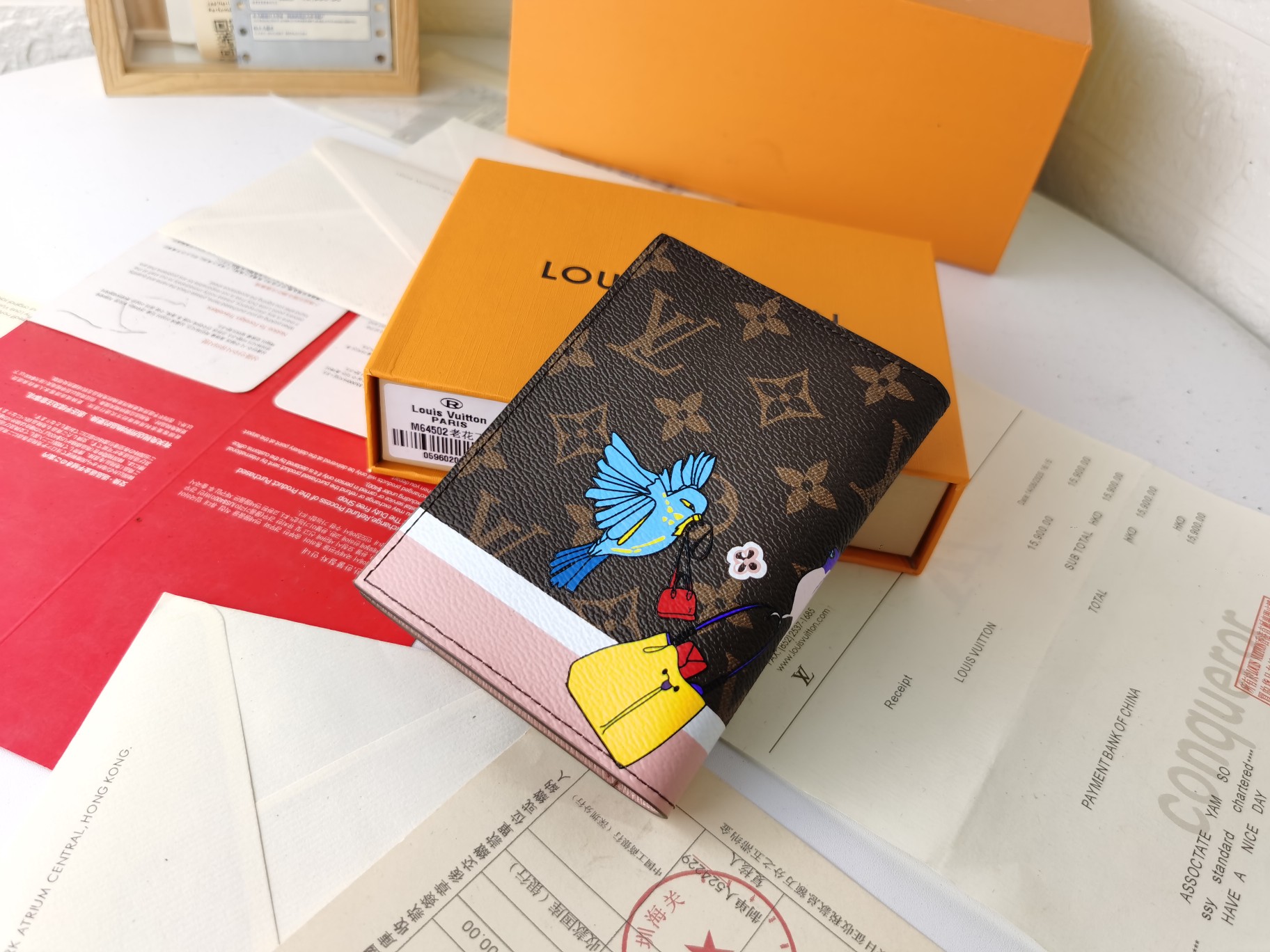 M64502パスポートケース - 高級感あふれる粒纹小牛皮内装