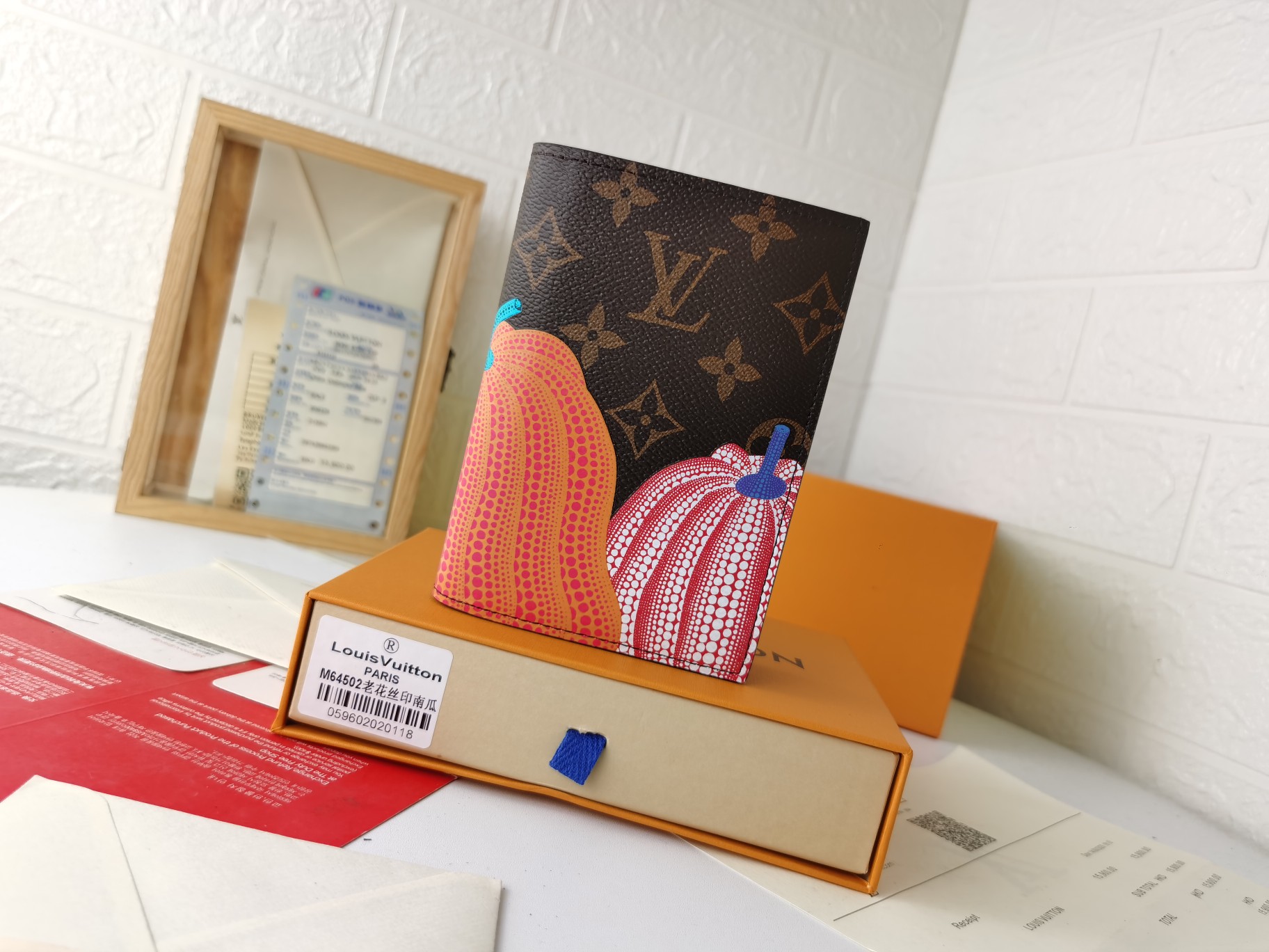 M64502パスポートケース|高級粒纹小牛皮の旅行アクセサリー