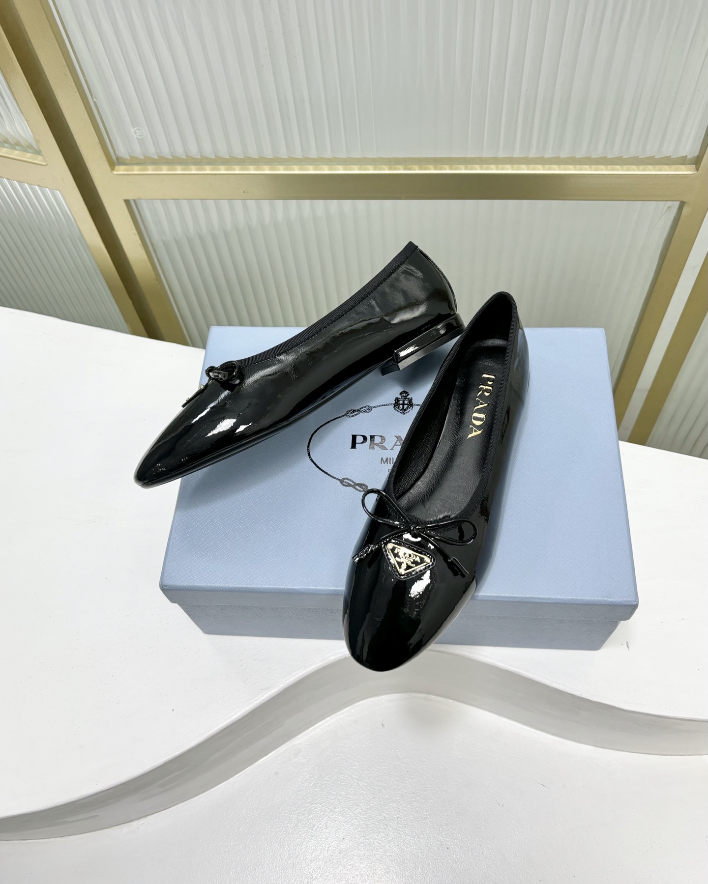 Prada Women's Black Leather Ballet Flats with Bow and Logo Accent 7 i1741010986197 1833 0 9