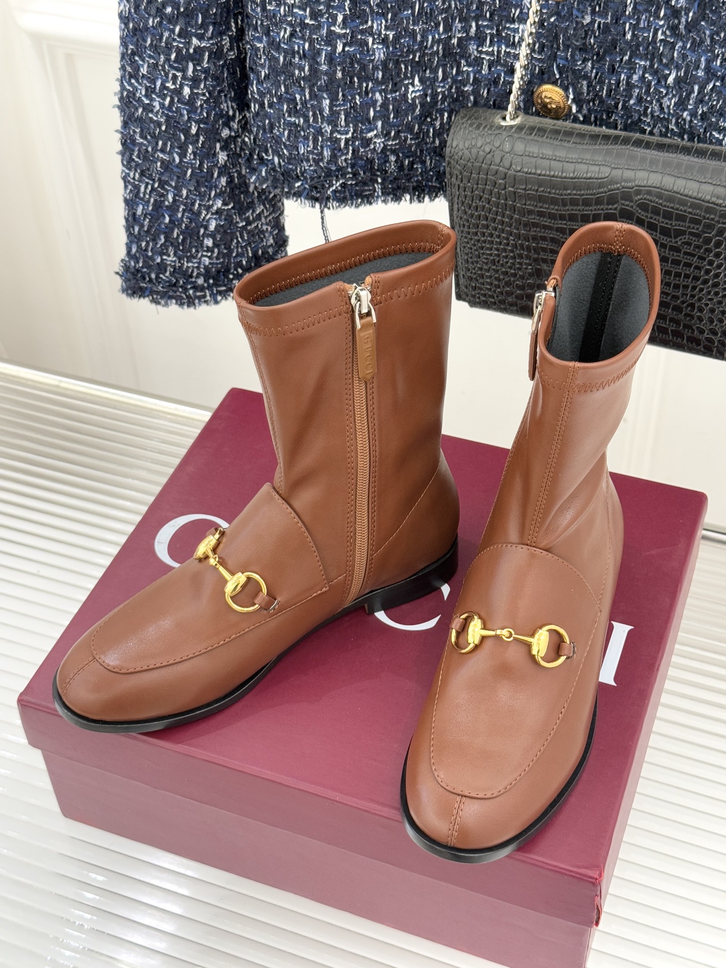 Gucci/古驰经典双G马衔扣复古乐福弹力靴短靴当百年马术基因邂逅现代穿着哲学这款弹力靴便有了跨越时光的