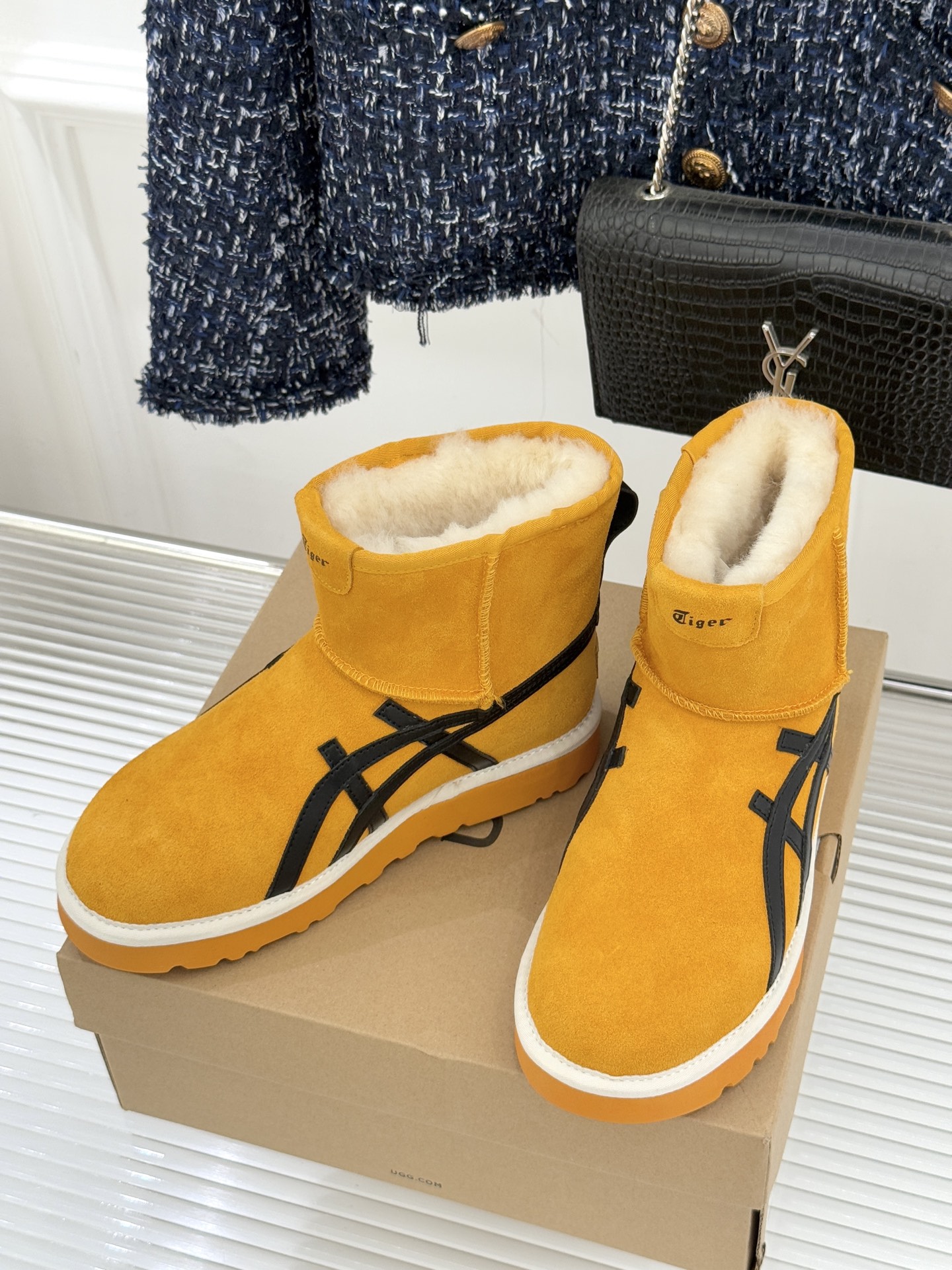 UGG X PUMA彪马联名款新品雪地靴当雪地靴界的保暖标杆UGG与运动领域的潮流先锋PUMA跨界相拥打