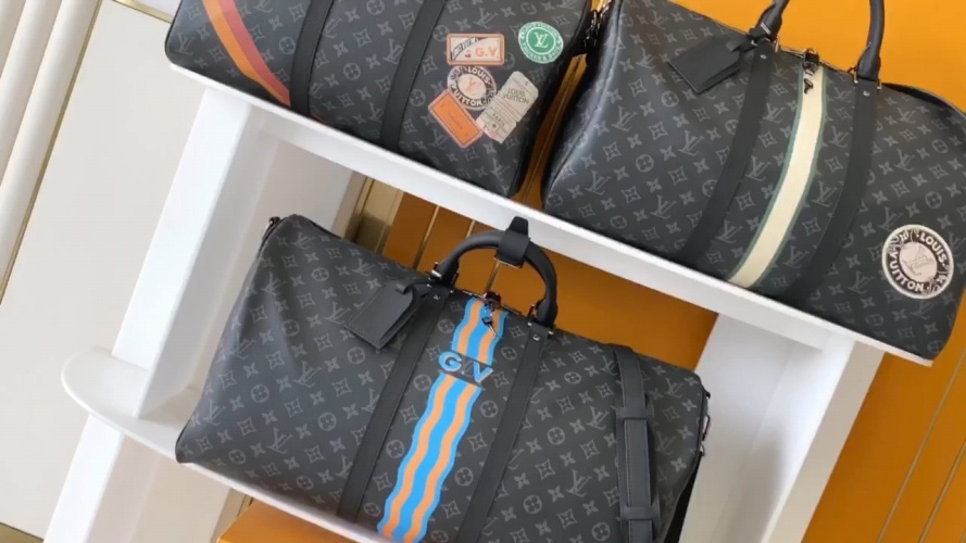 Louis Vuitton Black Flower Duffle Bag, 45-55 cm Travel Companion 1 Louis Vuitton Black Flower Duffle Bag, 45-55 cm Travel Companion