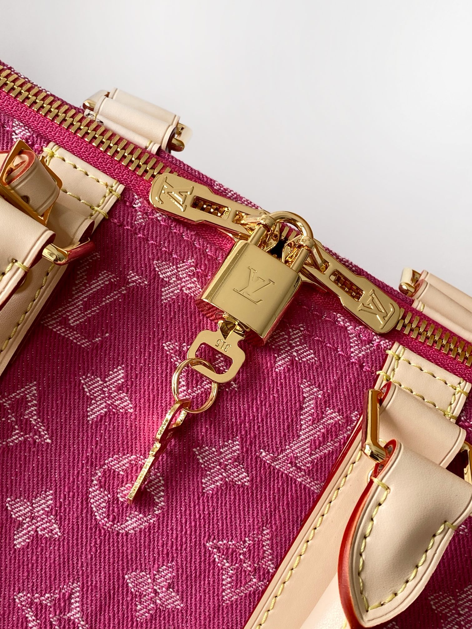 Louis Vuitton M27944玫红牛仔 163c01动态芯片