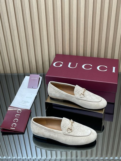 Gucci Jordaan Loafer with Embossed GG Pattern in Beige Suede 1 Gucci Jordaan Loafer with Embossed GG Pattern in Beige Suede