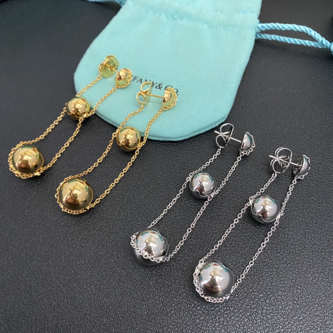 Tiffany Boucles d'oreilles polies à la main nœud concentrique lien émotionnel technologie nanométrique spatiale force et élégance - qualité supérieure