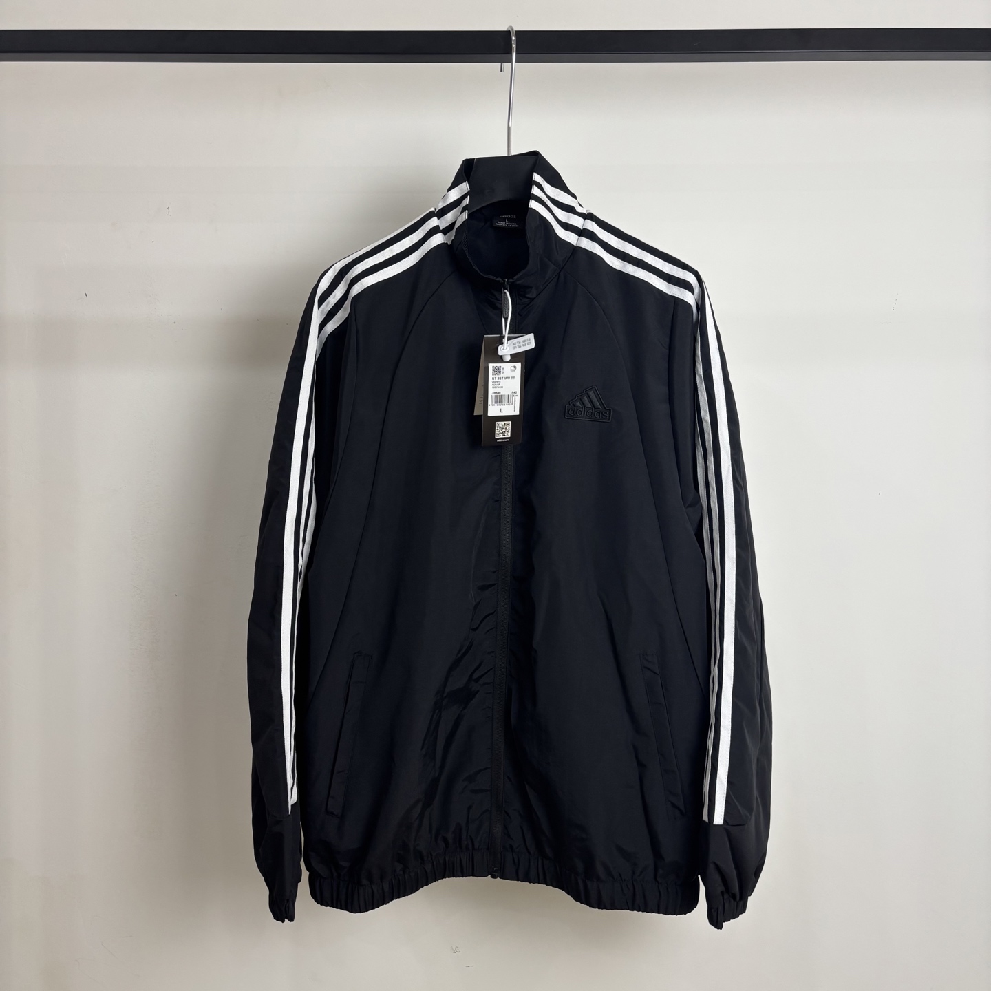Adidas Men's Lightweight Windbreaker Jacket with Signature Three-Stripe Design 2 i1740840865977 8614 0 2