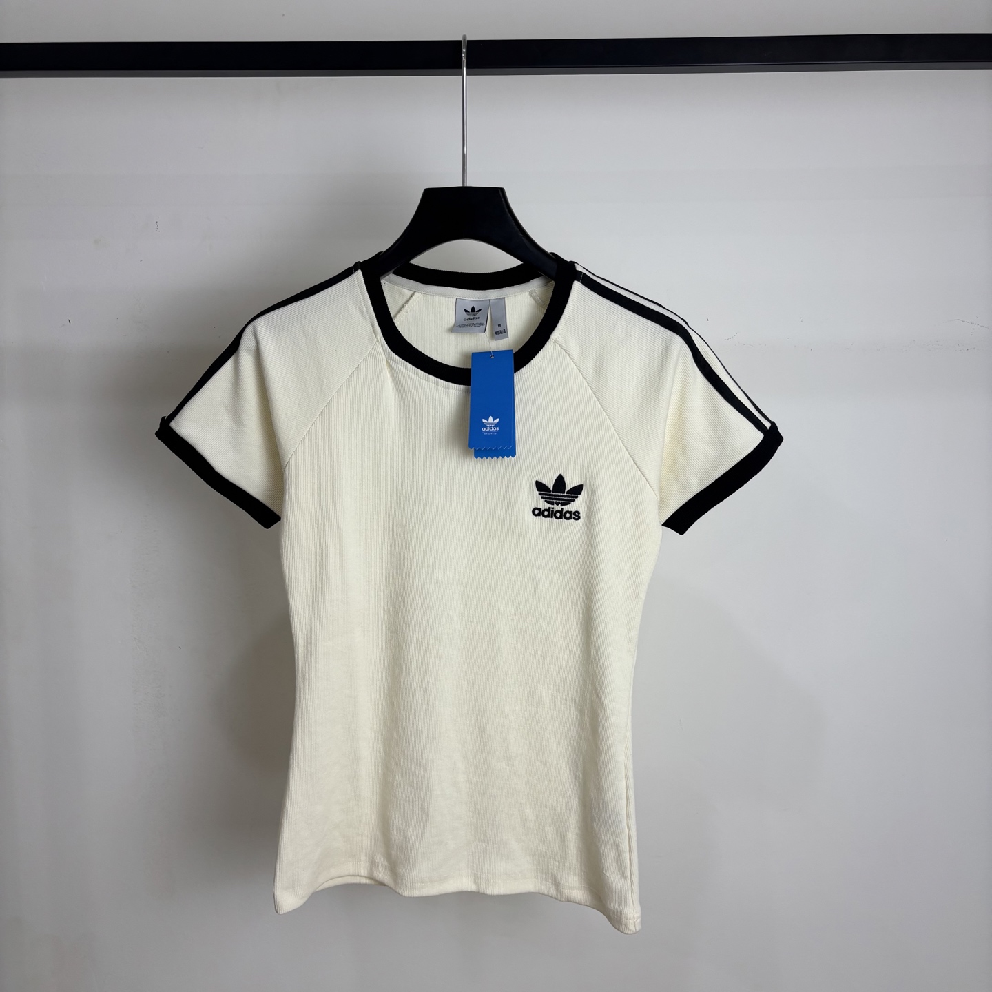 Adidas Women’s Classic Logo T-Shirt in Sky Blue and Rice White, Sizes S-XL.