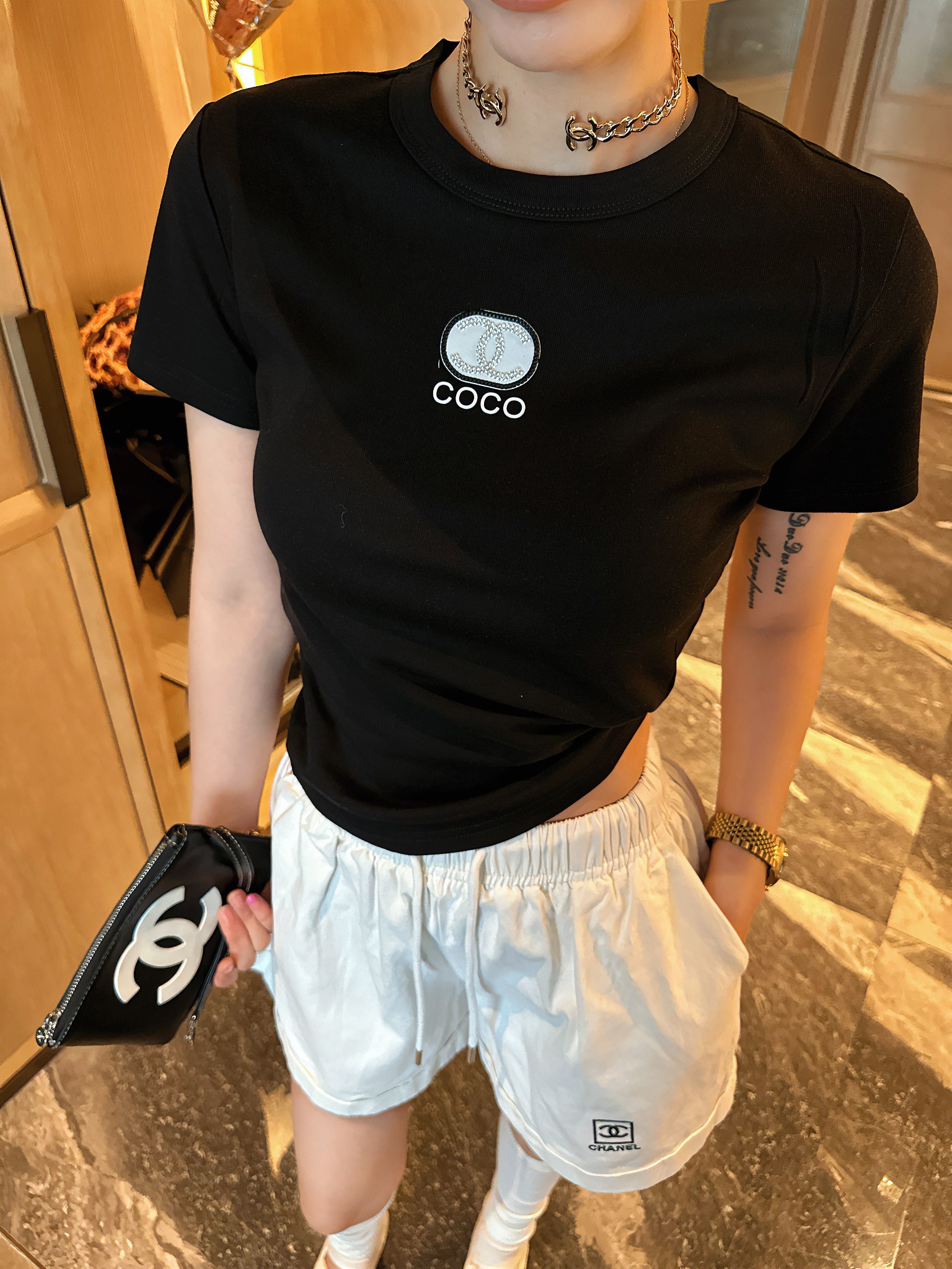 Vente de Chine
 Chanel Vêtements T-Shirt Noir Blanc Imprimé Coton
