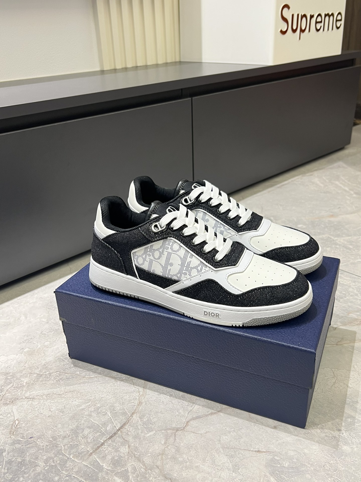 Dior B27 High-Top Sneakers in Gray and White Smooth Calfskin Leather 4 i1717491056 388 4