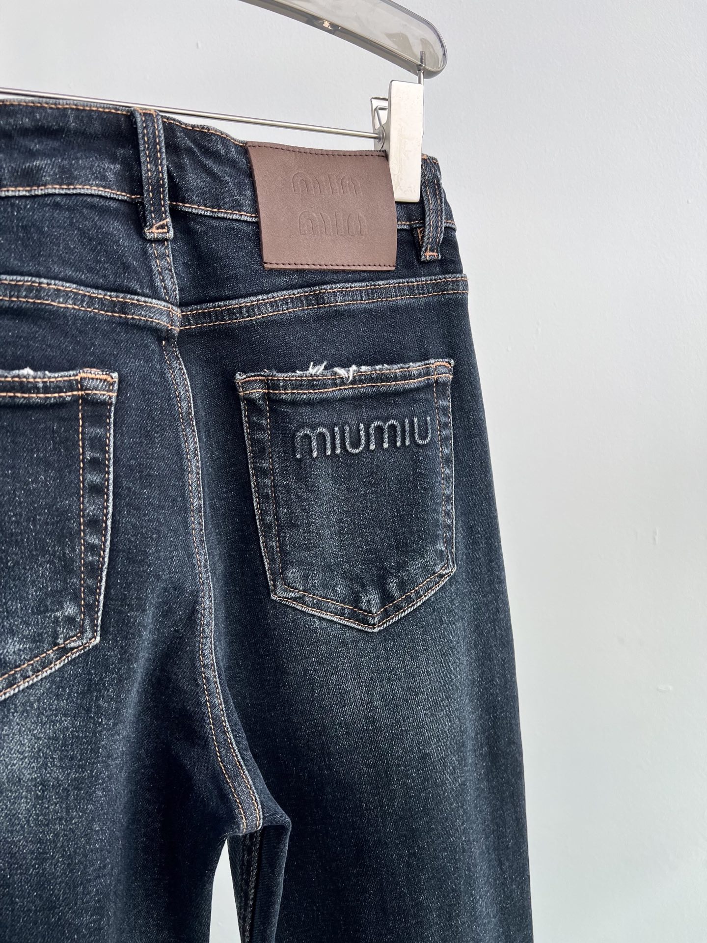 Miu Miu Vintage High-Waisted Flare Jeans, Gray-Blue Wash, Logo Detail 6 i1759659252422 7975 0 4