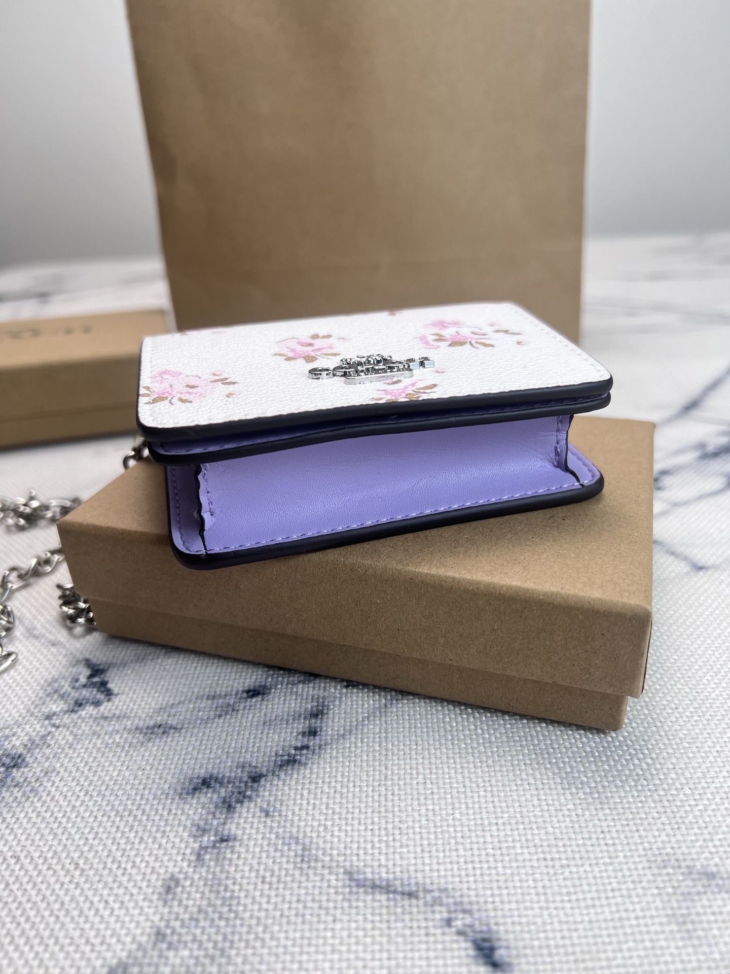 Coach COACH蔻驰 CAL70花卉印花短款斜挎钱包零钱包 按扣开合折叠每一款都正中老阿姨的少女心
