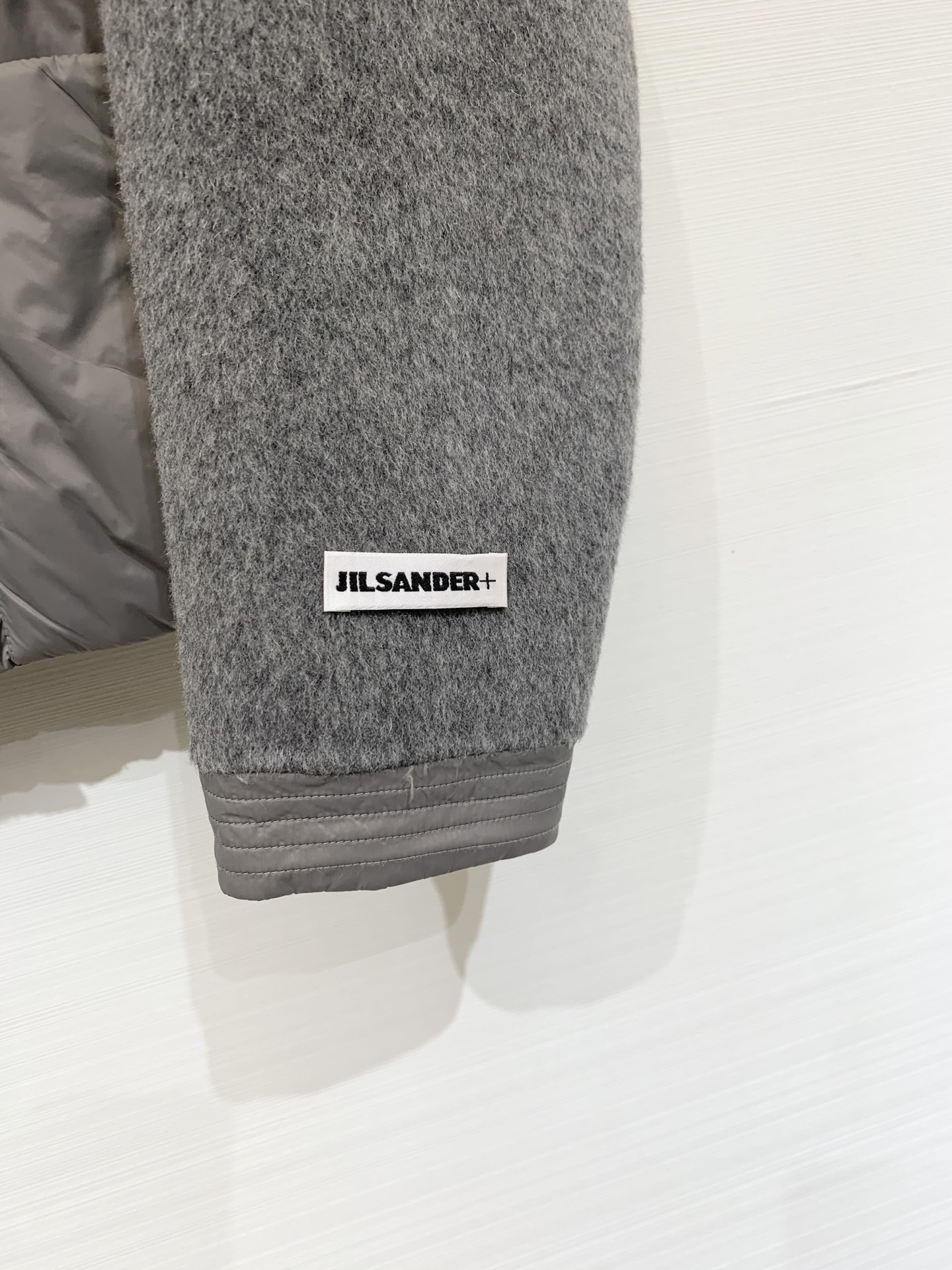 JILSANDER 25秋冬新款 氛围感日系质感穿搭🖤羽绒拼接羊毛呢外套 让原本厚重的双面呢外套一下子有
