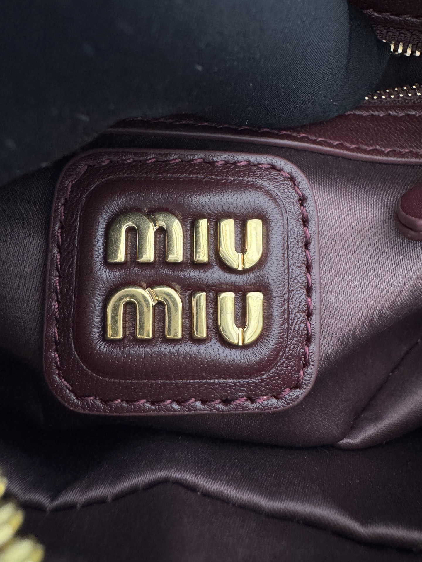 Miu Miu Burgundy Matelassé Boston Bag