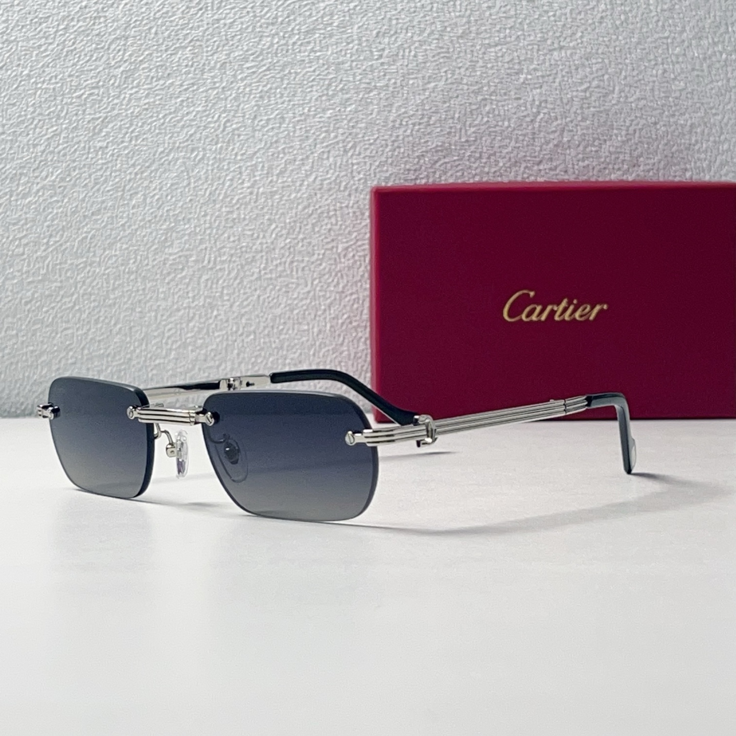 Cartier Frameless Metal Square Folding Sunglasses
