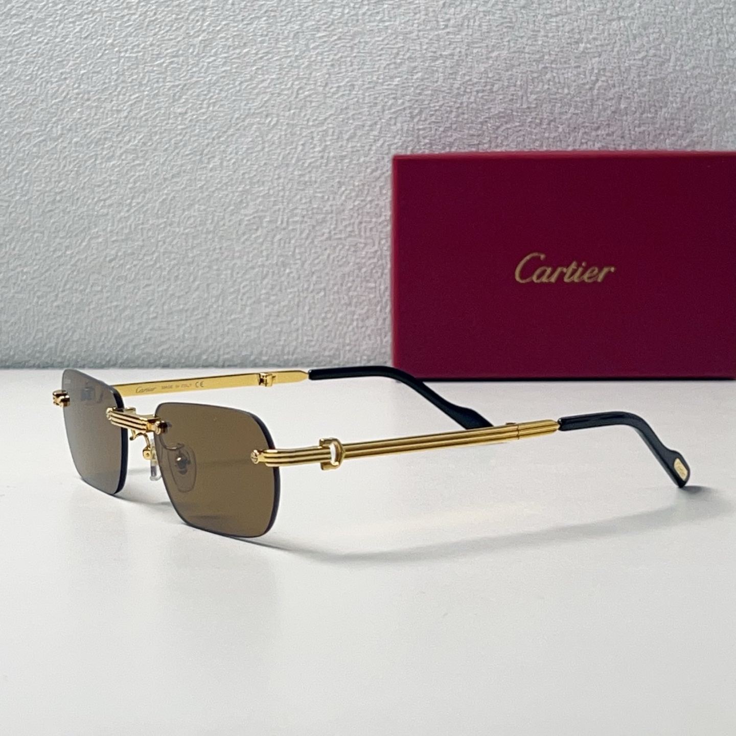 Cartier Frameless Metal Square Folding Sunglasses