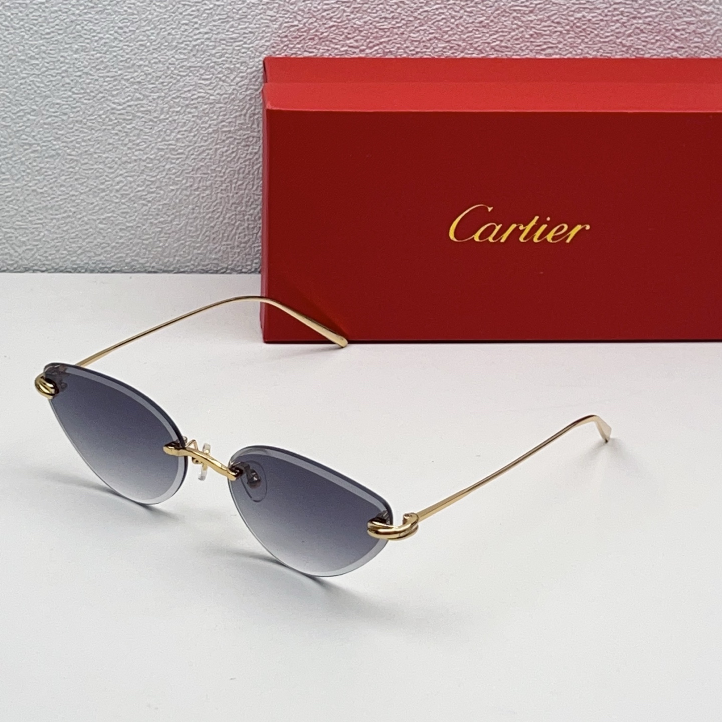 Cartier Rimless Metal Oval Sunglasses
