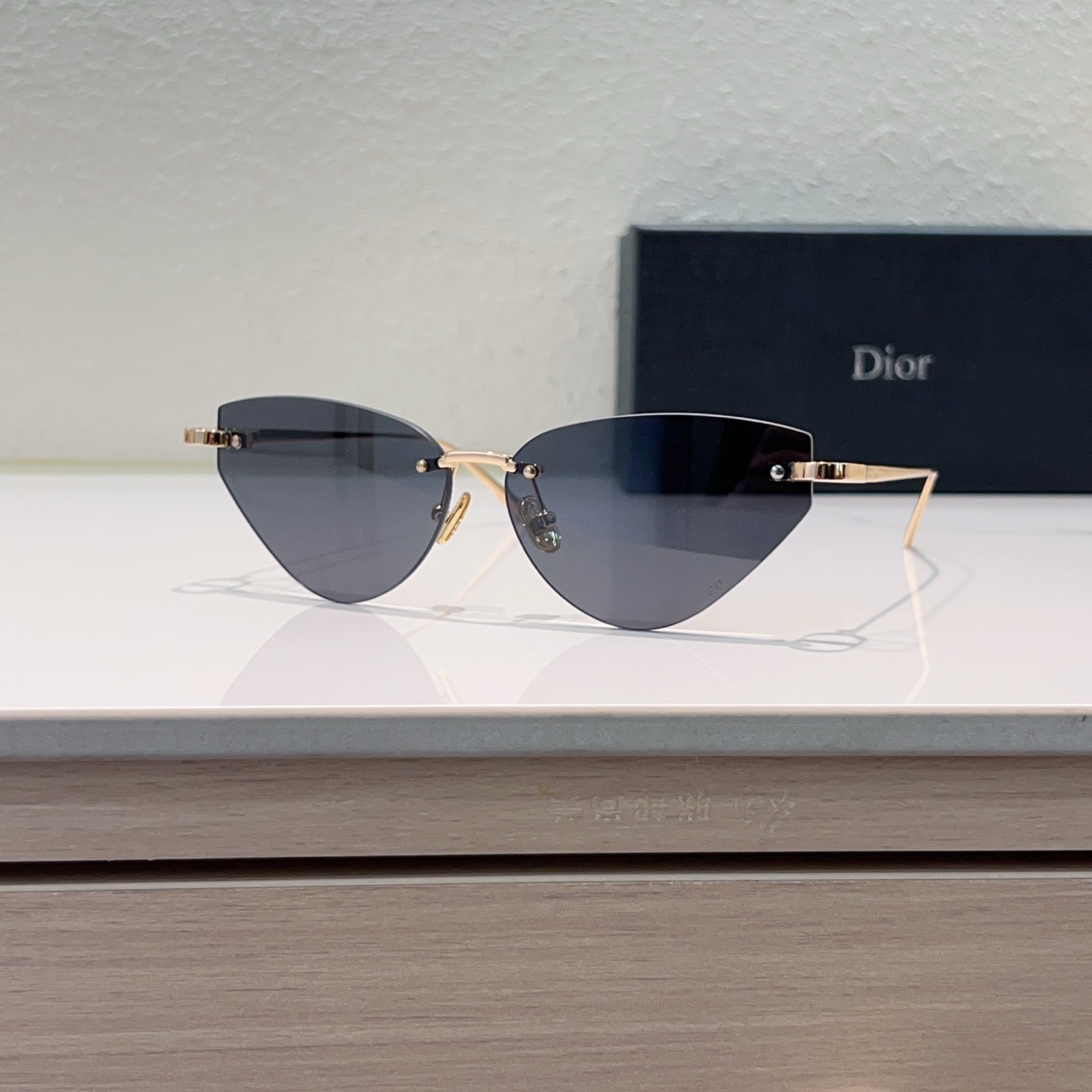 DIOR Lunettes de soleil sans monture métal œil-de-chat