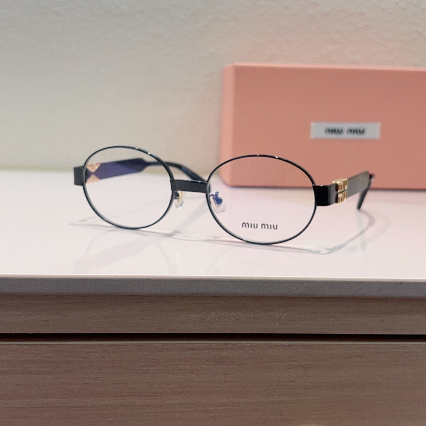 MIUMIU Round Metal Frame