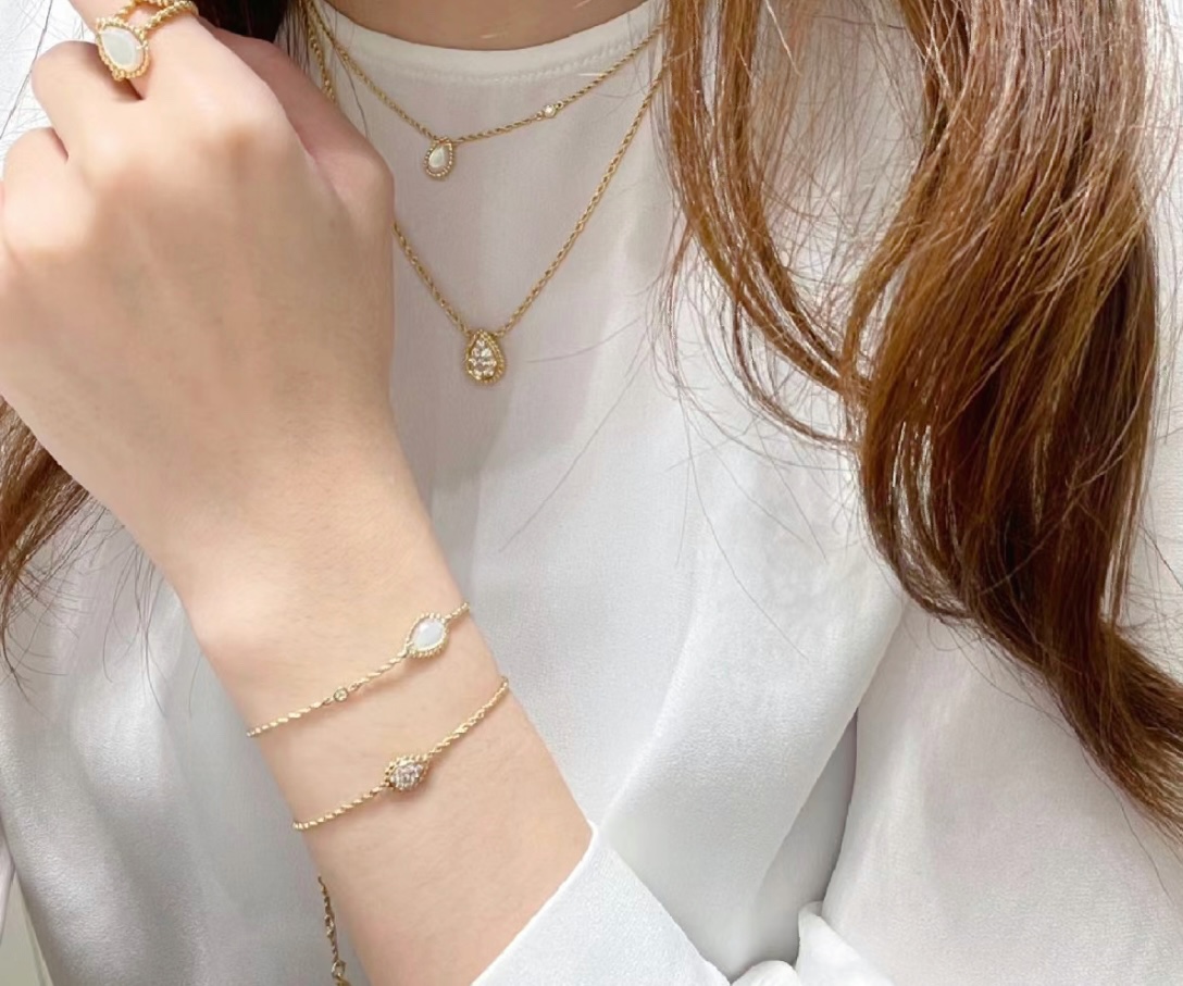 Luxury Jewelry Collection: Gold, White, Peacocks, Poseidon, Elegant, Stylish, Casual, Versatile.