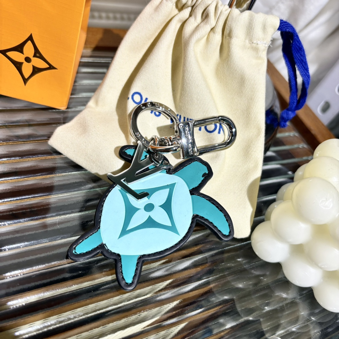 Front view of the Aquatics handbag charm