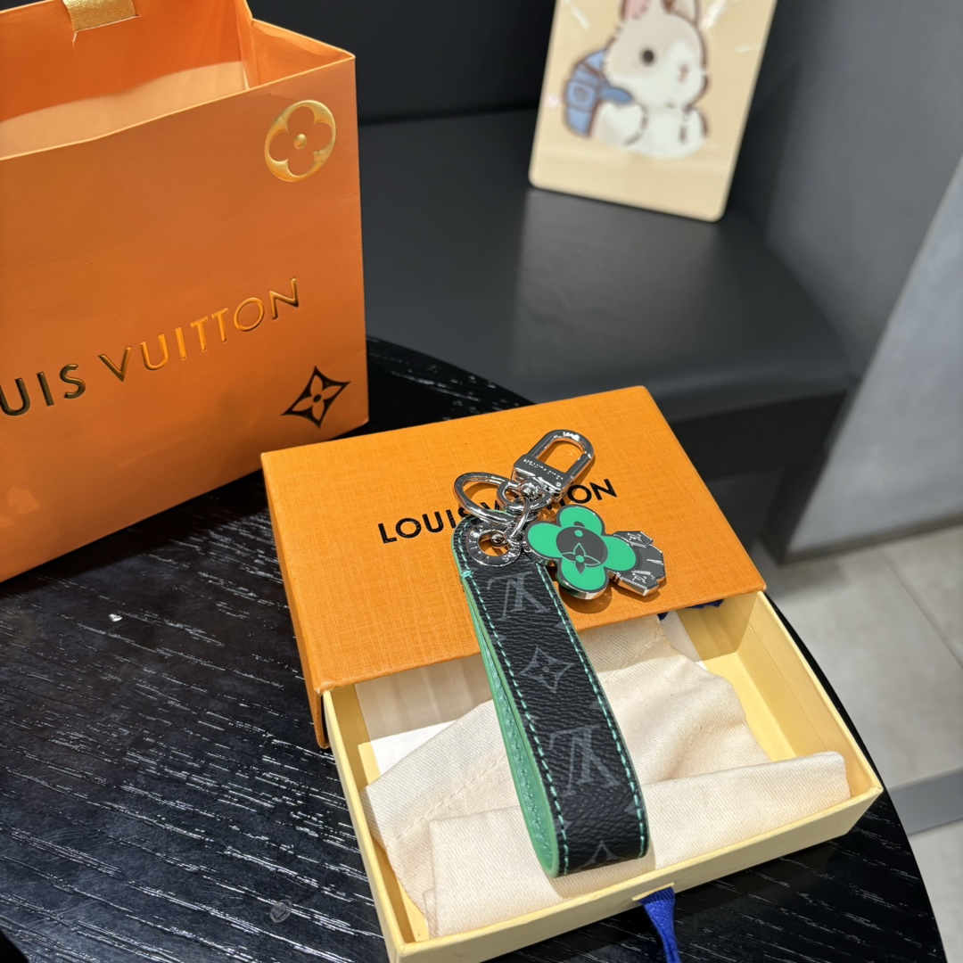 Close-up detail of the Vivienne Dragonne charm