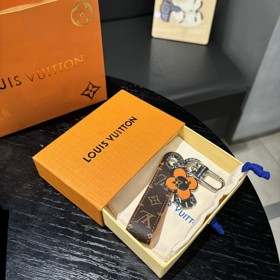 Close-up detail of the Vivienne Dragonne charm