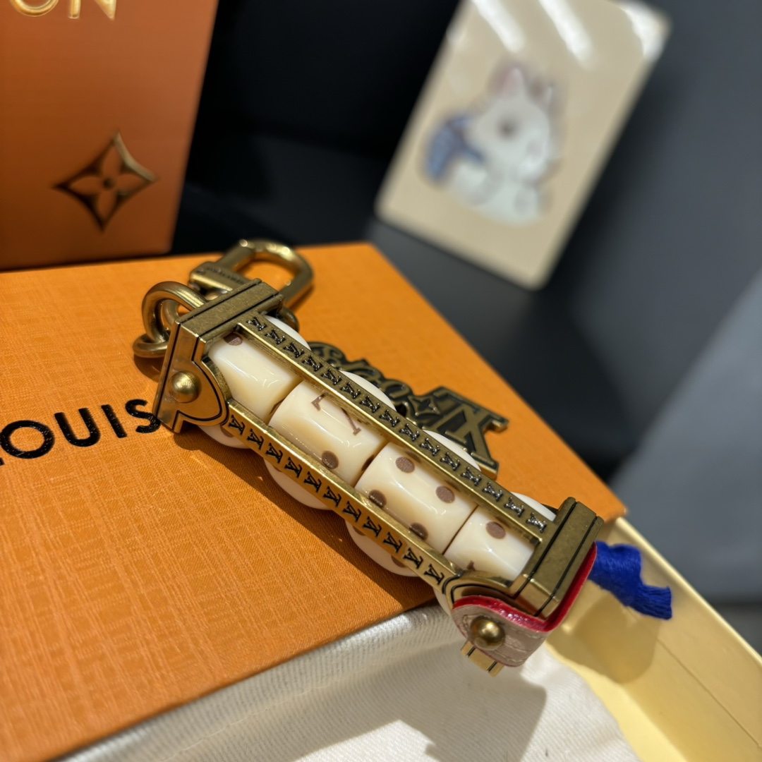 Leather keychain attached to keys or bag