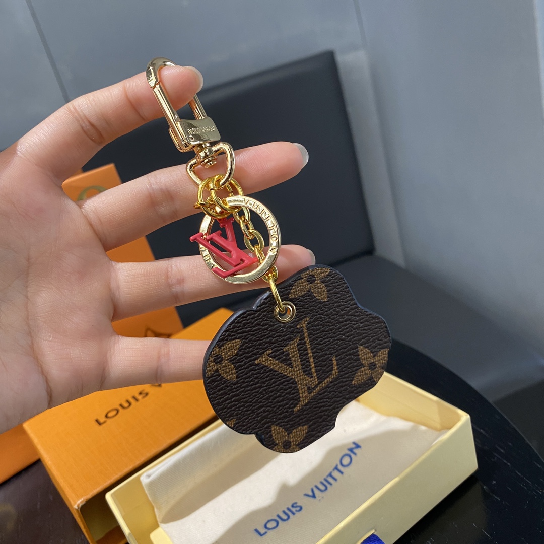 Animogram Leopard Keychain attached to a handbag