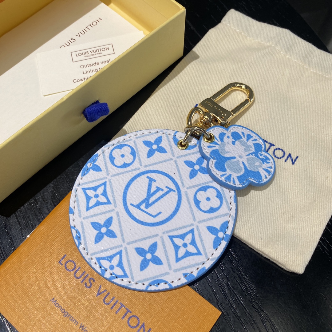 Watercolor print leather keychain attached to keys