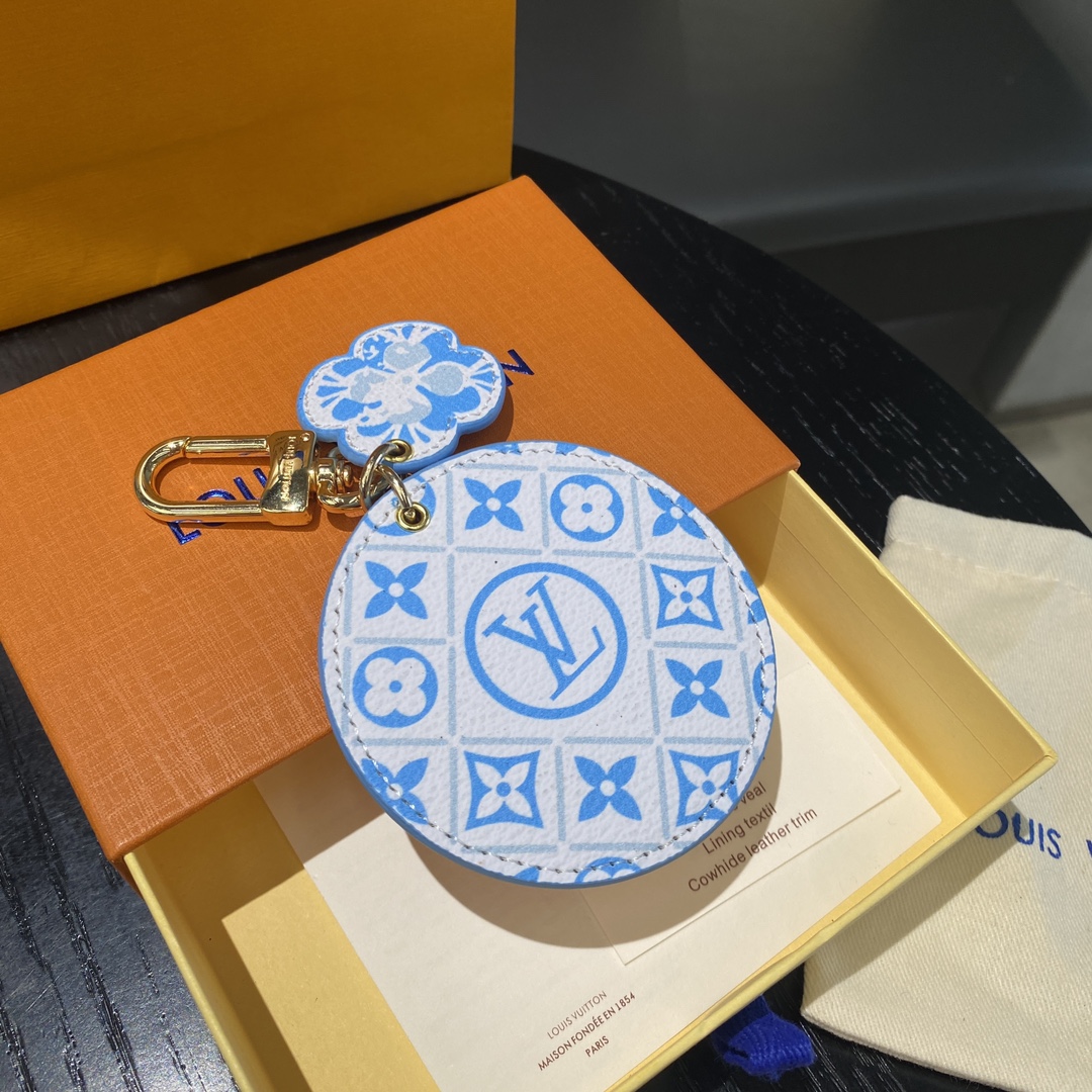 Front view of a watercolor print leather keychain