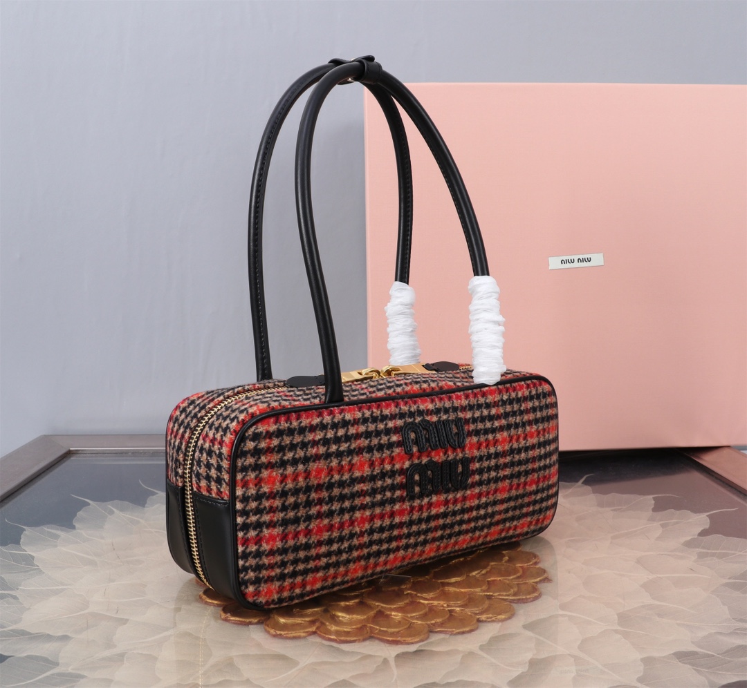 Miu Miu Officially on sale 5bb148, miumiu's new houndstooth bowling ball. It is handmade and its bold and innovative design perfectly interprets