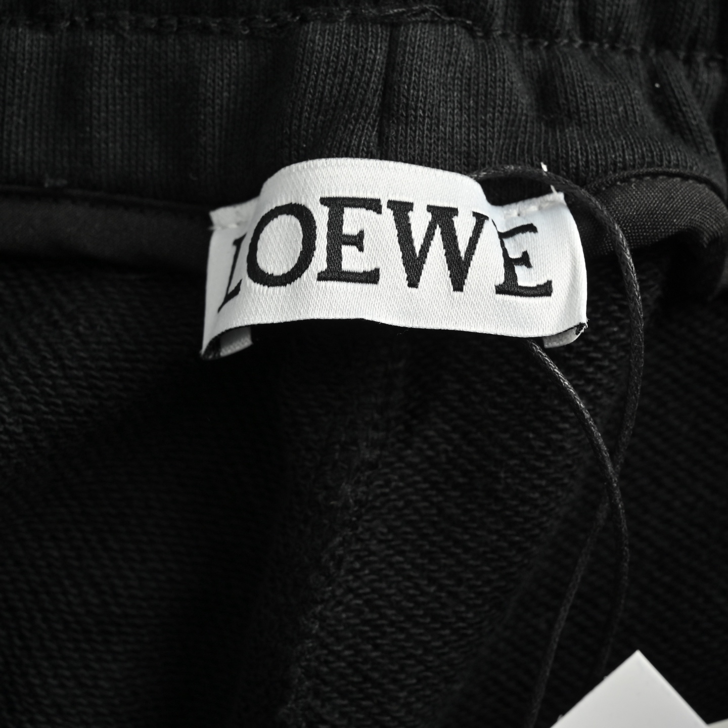 Loewe/罗意威 经典侧边织带刺绣短裤 爆款来袭复古潮流织带点缀松紧腰休闲五分裤 黑色 藏青