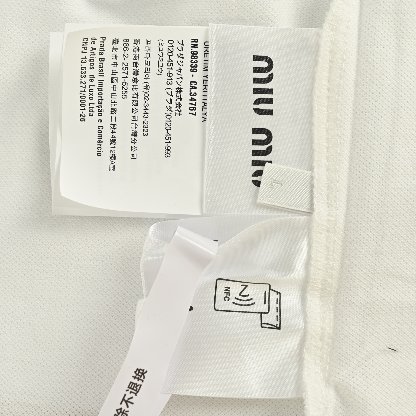 MiuMiu/缪缪 刺绣字母红条领Polo长袖