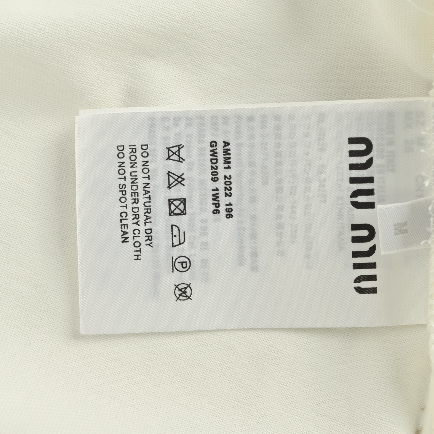 Miumiu/缪缪 胸前经典字母黑色领口长袖白色