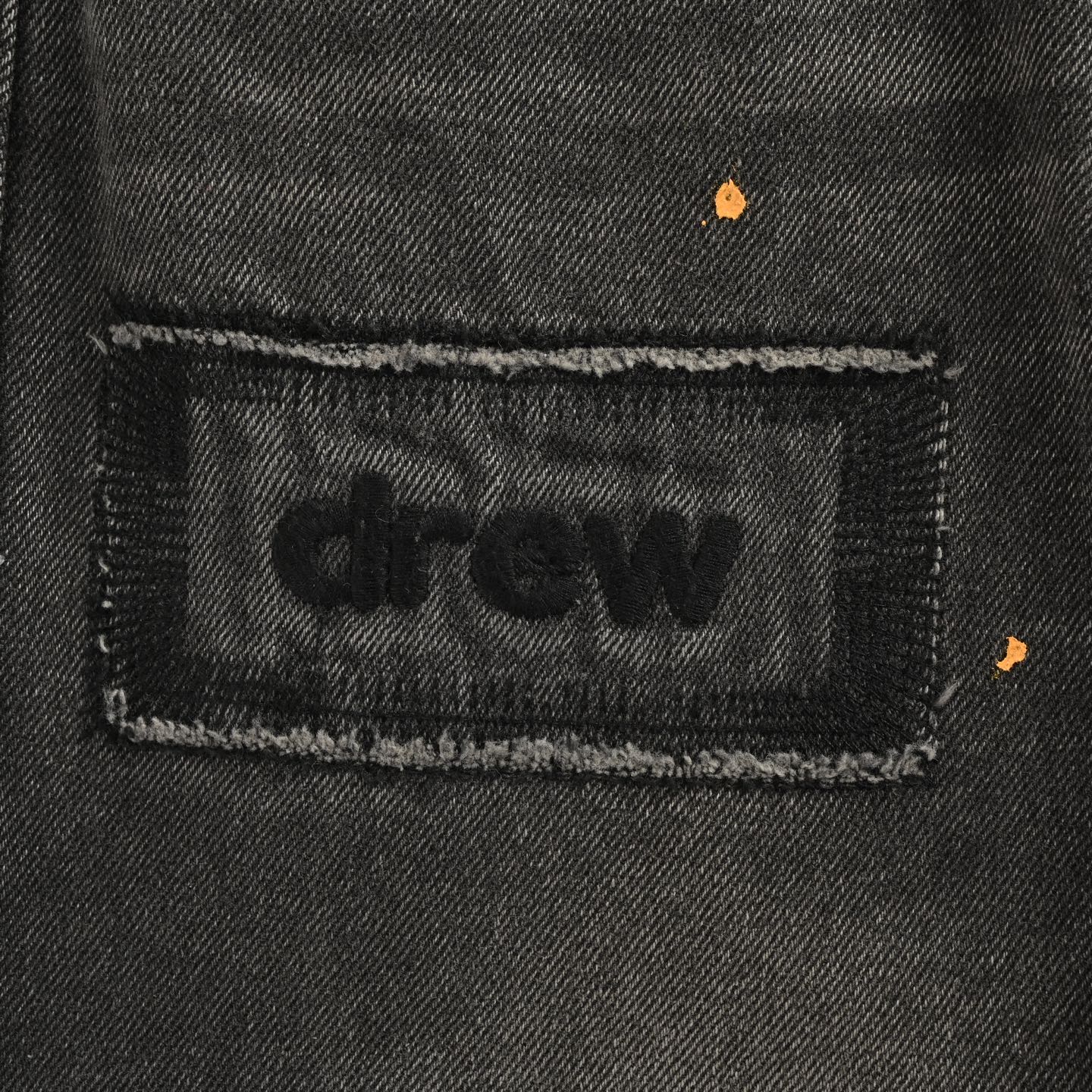 Drew House 笑脸破洞水洗泼墨牛仔裤