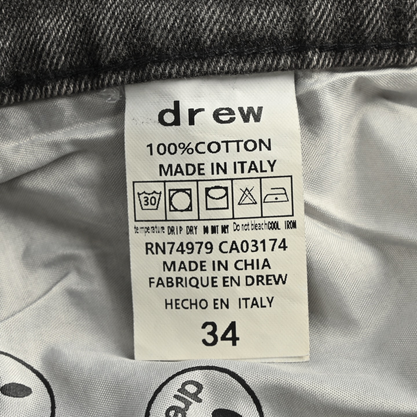 Drew House 笑脸破洞水洗泼墨牛仔裤