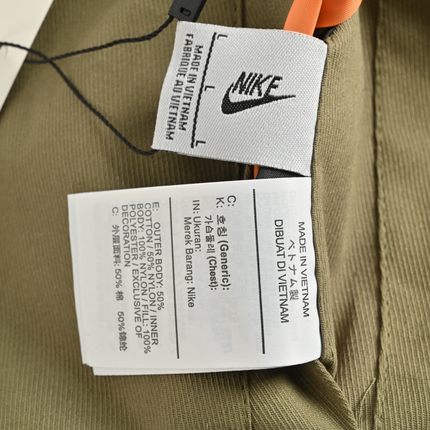 Nike & Stussy 联名款双面穿棉服外套
