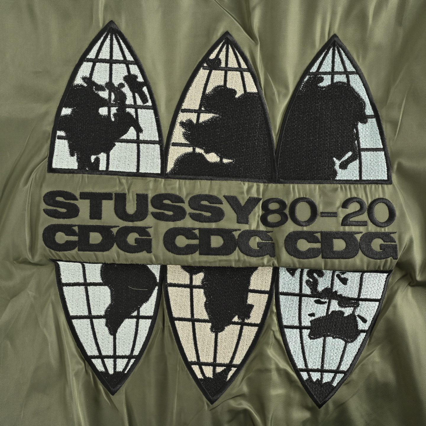 Stussy & CDG 联名款刺绣飞行夹克外套 Stussy x CDG MA1 JACKET 40周年联名地图限定款面料采用军绿绸缎尼龙 军绿色