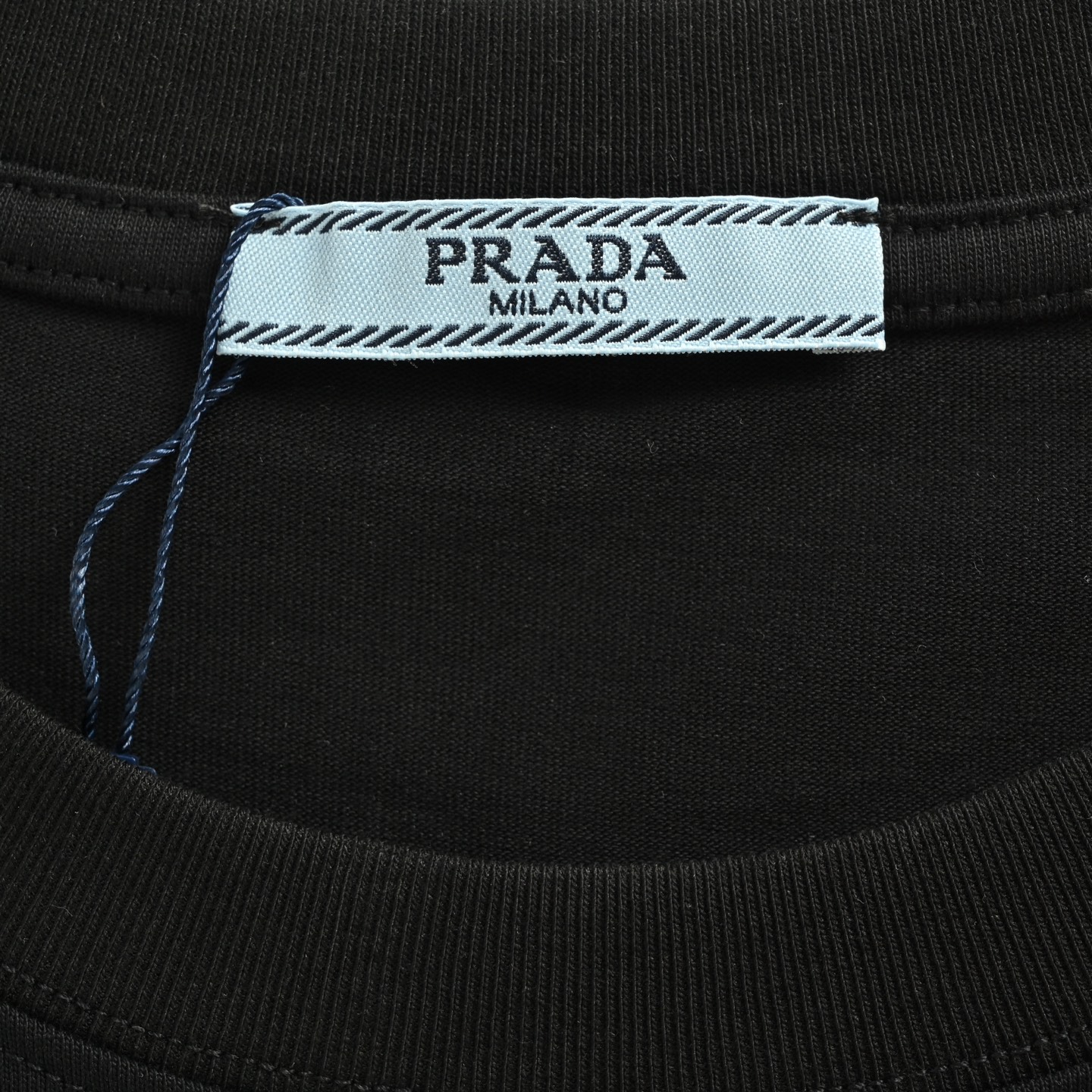 Prada/普拉达 红色硅胶饰条口袋刺绣短袖