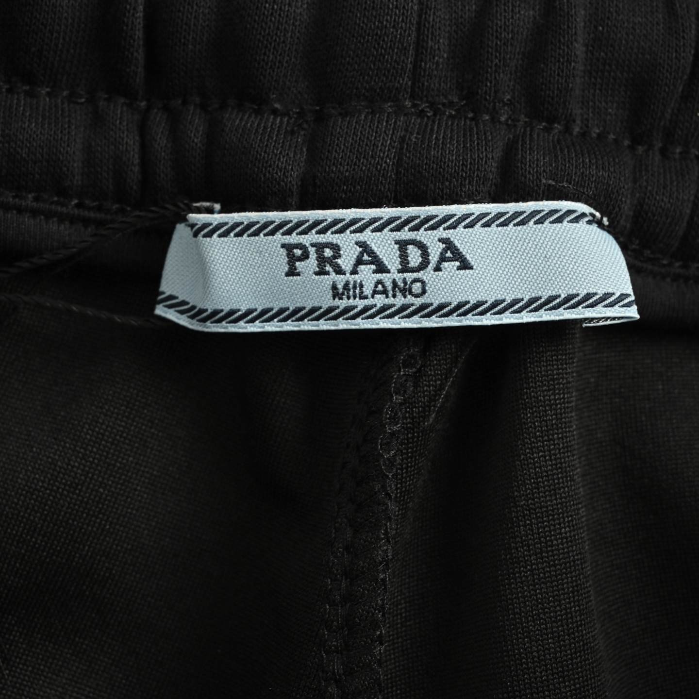 Prada/普拉达 口袋字母印花红色饰条长裤