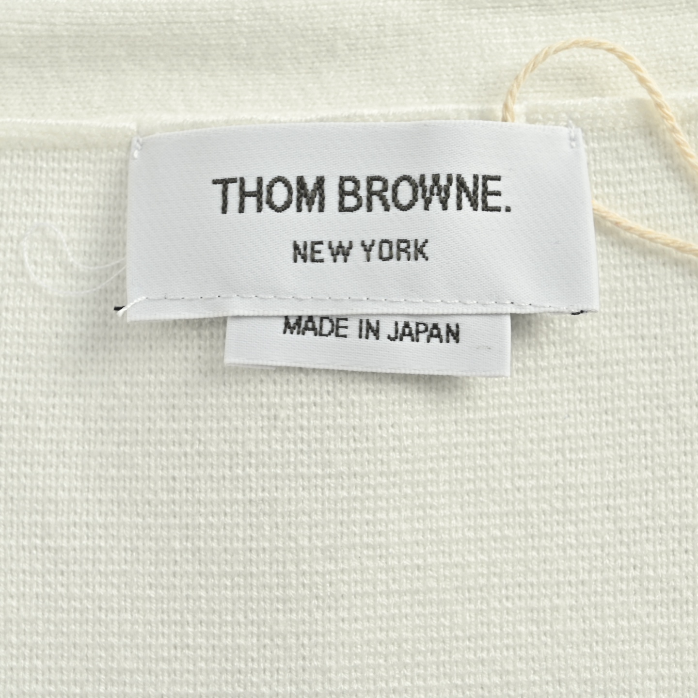 Thom Browne/汤姆布朗 25Fw 前短后长毛衣开衫